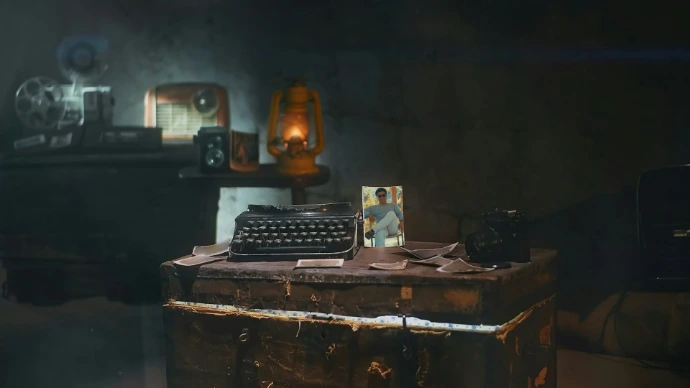 black and gray ip desk phone on brown wooden desk